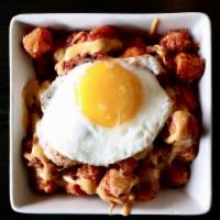 Breakfast Style-Sweet Potato Tots · crispy bacon, sunny side up egg, house-made cheese sauce