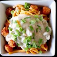 Southern Style-Sweet Potato Tots · house-made sausage gravy, cheddar cheese, green onions