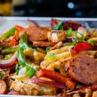 Cajun Chicken & Sausage Fries · 1/2 LB WAFFLE FRIES, BLACKENED CHICKEN FRIES, ANDOUILLE SAUSAGE, PEPPERS, ONIONS & CAJUN SEA...