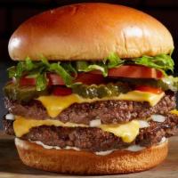 Double Cheeseburger · 2 ¼ lb. patties of fresh beef with melted cheese, pickle, lettuce, and tomato