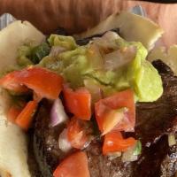 “Tex Mex” Angus Steak Taco · Black beans, grilled onions, guacamole, jack cheese, and pico de gallo.