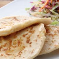 Cheese Pupusas · Three hand-made corn tortillas stuffed with cheese and black bean soup. Served with curtido.