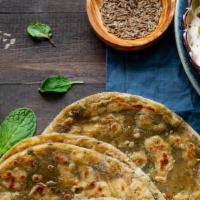 Mint Paratha Mint · Whole wheat bread with mint and baked to perfection.