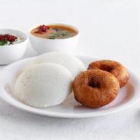 Idly And Wada Little One · A round steamed lentil and rice cake and doughnut shaped lentil fried pastry and served with...
