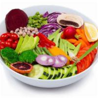 Fadi'S Vegetarian Sampler · A sample portion of dips, appetizers, salad, hearty vegetables.