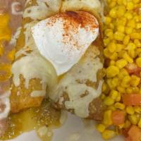 Suizas Chicken Enchiladas (2 Pc.) · Topped with Verde, refried, corn.