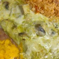 Poblano Enchiladas · chicken,mushroom,onion inside topped w/poblano sauce