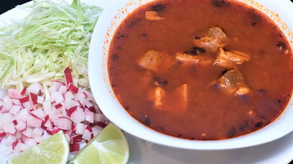 Pozole · Traditional pork stew with hominy, dried chiles, red onions, cabbage, radishes and spices