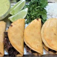 Tacos De Barbacoa · Five mini corn tortillas tacos with barbacoa. Your choice of salsa Tlaquepaque