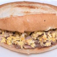 Egg Sandwich · Scrambled eggs with your choice of ham, potatoes, sausage, chorizo, or a la Mexicana, with r...