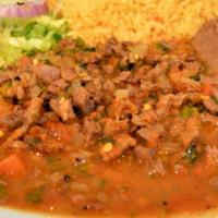Bistec A La Mexicana · Chopped beef steak grilled with our special salsa and tomatoes, onions and jalapeños, served...
