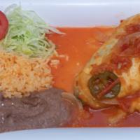 Chile Relleno · Breaded poblano pepper filled with cheese and covered with our tomato sauce, served with ric...