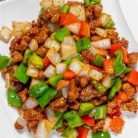 Black Pepper Chicken · Stir-fried Dark Meat Chicken with Green Pepper,Red Peppers,Yellow Onions and Black Pepper