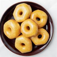 Half-Dozen Glazed Donuts · A half-dozen (6) of our FAMOUS ORIGINAL yeast-raised donut covered in glaze.