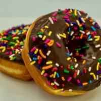 Chocolate Iced Sprinkles · Our yeast-raised donut dipped in chocolate icing covered in sprinkles.