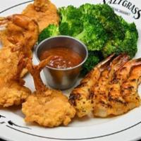 Shrimp Duo · Fried and grilled shrimp. Served with a side & your choice of dinner Caesar salad, dinner sa...