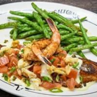 Blackened Redfish · Shrimp, crawfish, diced tomatoes, green onions, lemon butter. Served with a side & your choi...