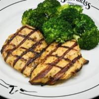 Grilled Chicken Breast · Marinated grilled chicken breast. Served with a side & your choice of dinner Caesar salad, d...
