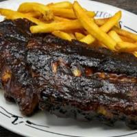 Bbq Pork Ribs · Slow-cooked & “fall-off-the-bone.” Served with a side & your choice of dinner Caesar salad, ...