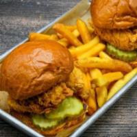Kid'S Chicken Sliders · 2 mini sliders with pickles. Choice of side fries, broccoli, or mashed potatoes.