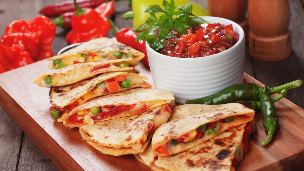 Quesadilla · Philly steak, grilled chicken or brisket with melted cheeses, pico and side of sour cream.