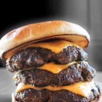 Half The Cow - Triple · Three 1/2 lb patties meat and slices of cheese only. Triple meat, triple cheese!
