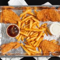 Chicken Tendies · 4 breaded chicken strips, fries and Texas toast. Served with choice of ranch, honey mustard ...