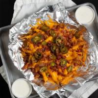 Cheese Fries (Half Order) · Topped with melted shredded cheddar, bacon and jalapeños. Served with a side of homemade Ran...