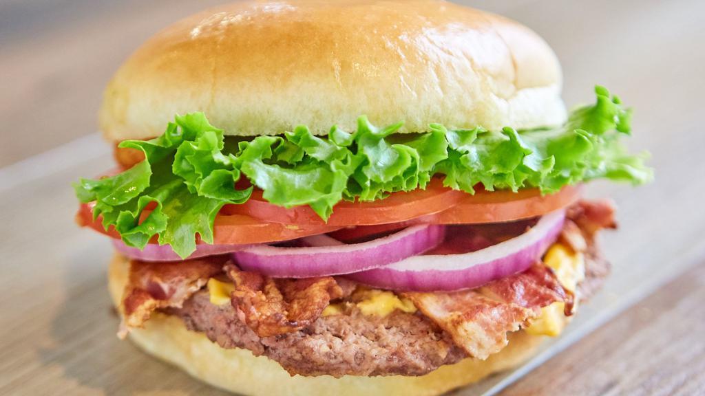 Bacon Cheeseburger · Mayonnaise, mustard, ketchup, cheese, pickles, romaine lettuce, tomatoes, and purple onions.