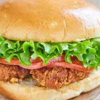 Crispy Chicken Sandwich · Mayonnaise, mustard, ketchup, pickles, romaine lettuce, tomatoes, and purple onions.