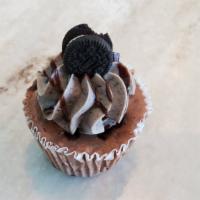 Double Stuff Cheesecake · Chocolate cheesecake with Oreo buttercream filled with a fluffy mellow through and through.