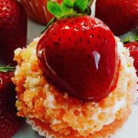 Strawberry Shortcake · Strawberry cake topped with a glazed  strawberry,  streusal crumble and  buttercream frosting.