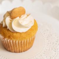 Banana Pudding · Moist banana cake topped with buttercream frosting and a vanilla wafer.