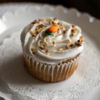 Carrot Cake · Complete with chopped pecans, cinnamon spice and a light buttercream frosting.