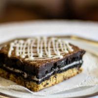 Slutty Brownie · Three layers of deliciousness bottom layer chocolate chip cookie, center layer Oreo cookie a...