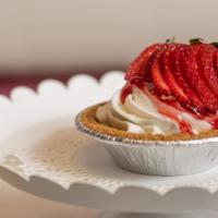 Mini Cheesecake · This creamy cheesecake with a Graham cracker crust is topped with whipped cream and glazed s...