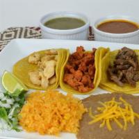 Taco Plate · Three tacos with your choice of meat served with side of rice, beans, cilantro, onion and li...