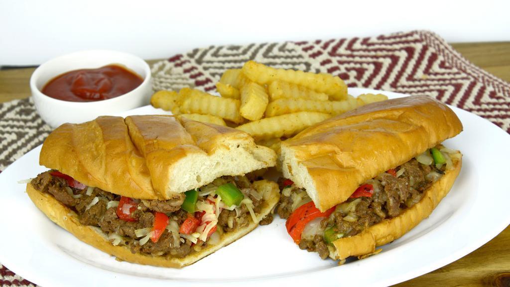Philly Cheese Steak · Served with onions, bell peppers, cheese, mayonnaise, and side of fries.