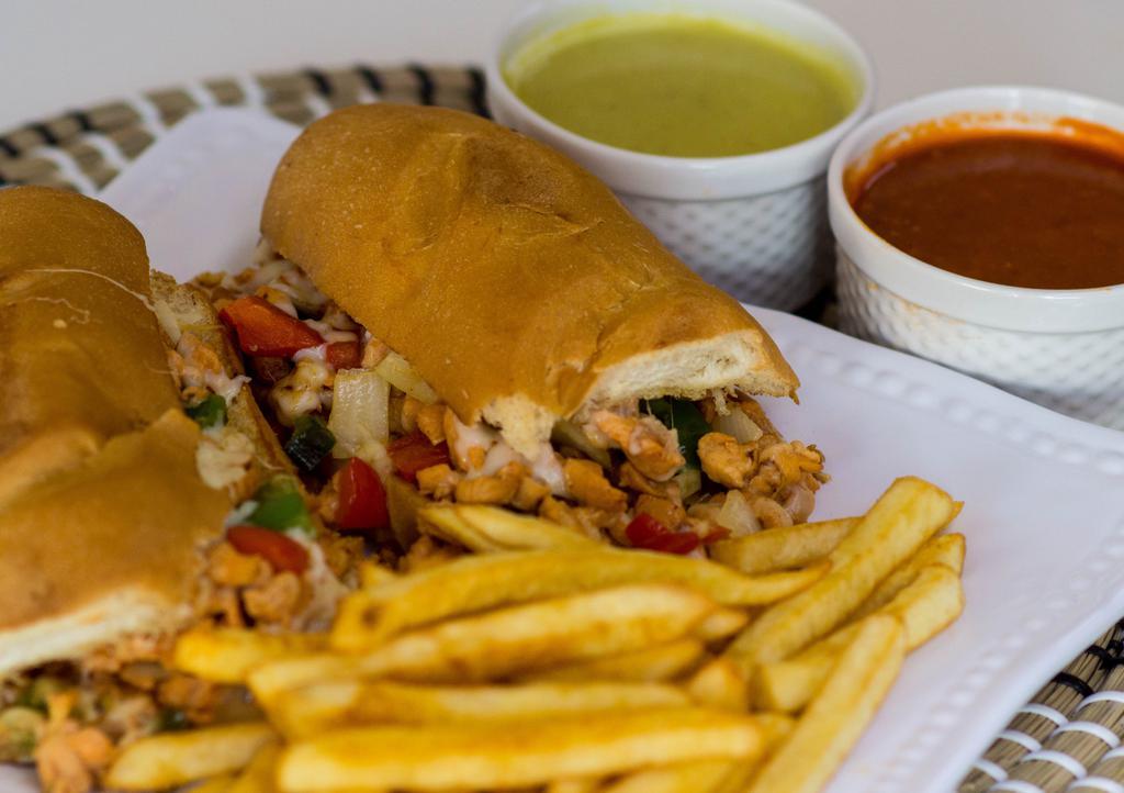 Chicken Sandwich · Sandwich made with grilled chicken, melted cheese, roasted bell peppers, onions and a side of fries.
