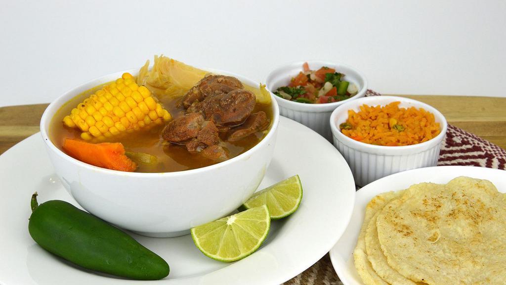 Caldo De Rez · Traditional Mexican beef brisket Soup 32oz served with side rice, cilantro, onions, limes.