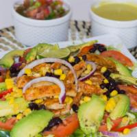 Chicken Salad · Grilled Chicken salad made with lettuce, tomatoes, red onions, avocado, corn, and black beans.