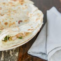 Quesadilla · Our most popular item! Grilled tortilla, Monterey jack cheese, pico de gallo and your choice...