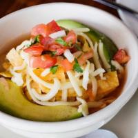 Sopa De Tortilla · A delicious traditional tortilla soup served with chicken, avocado slices & tortilla strips....