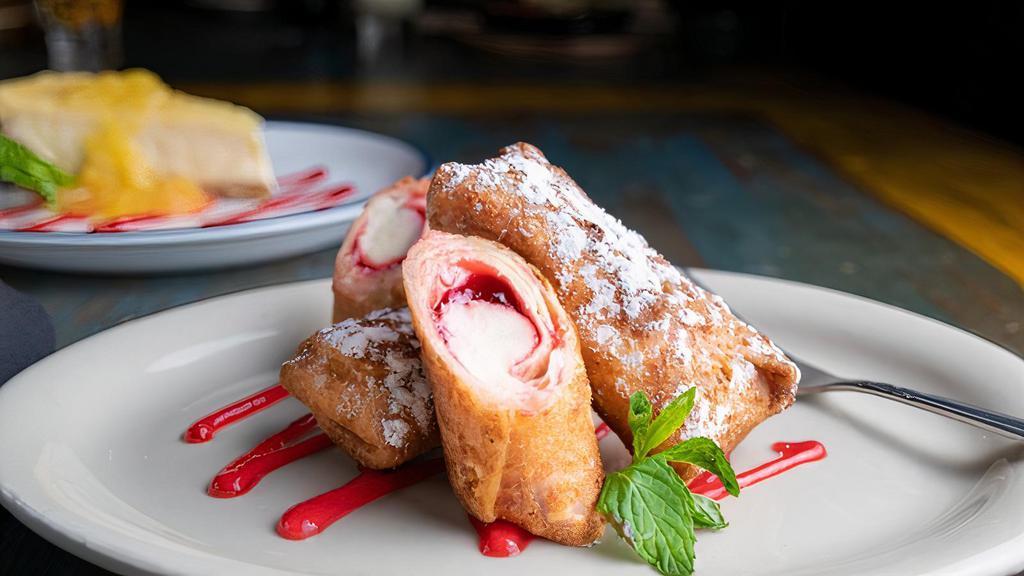 Raspberry Cheesecake Chimi'S · Golden fried mini chimi's filled with delicious raspberry cheesecake perfect for one or shared if you dare.