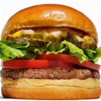 Turkey Burger  · Turkey patty served with lettuce, tomatoes, onions, pickles and mustard.
