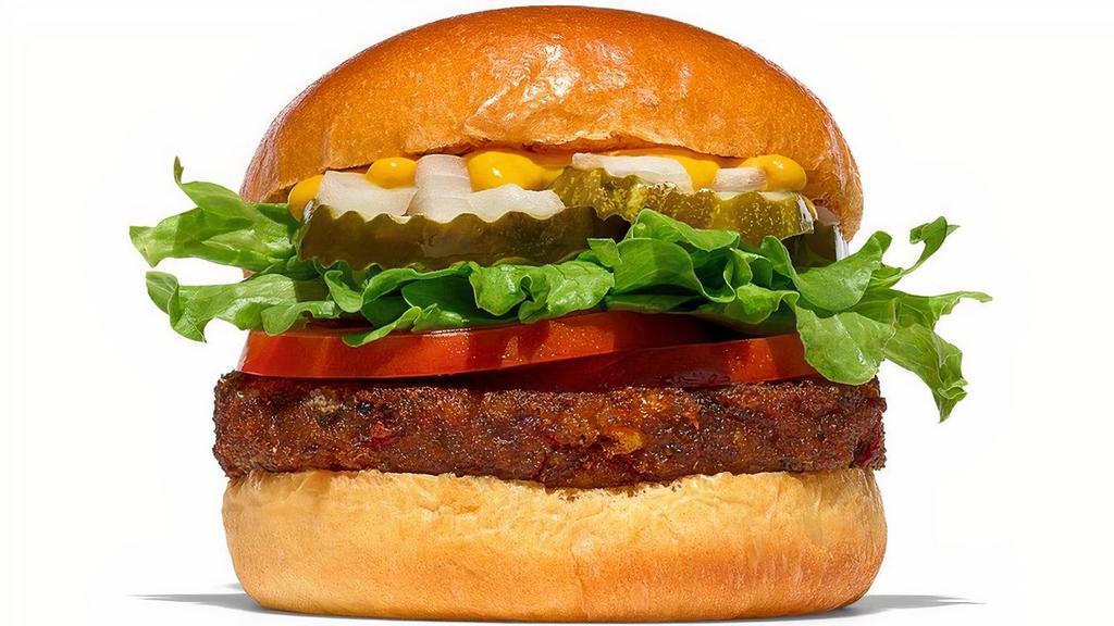 Veggie Burger  · A Black Bean Quinoa Burger patty served with lettuce, tomatoes, red onions, pickles and mustard.