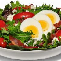 Cobb Salad · Freshly Chopped Romaine with grape tomatoes, chopped bacon, boiled egg and blue cheese crumb...
