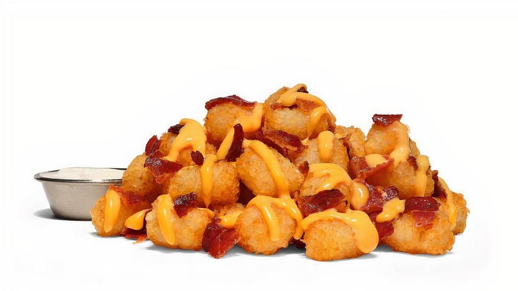 Loaded Tots · The Texas trifecta: tots, bacon, shredded cheddar and ranch and gluten free!.