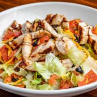 Stadium Salad · Grilled Chicken, Pepperoni, Bacon, Black Olives, Black Beans, Carrots, Tomatoes, and Shredde...