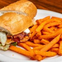 Blackjack Chicken · A Cajun seasoned chicken breast with pepperjack cheese, bacon, lettuce, tomato, onion, and r...